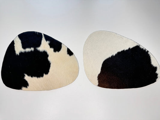 Echtes Kuhfell 2er - Platzset "Die klassische Schönheit" Tischset handgefertigt geruchsneutral Esstisch, oval schwarz/weiss 40x32cm - unendlich - schoen